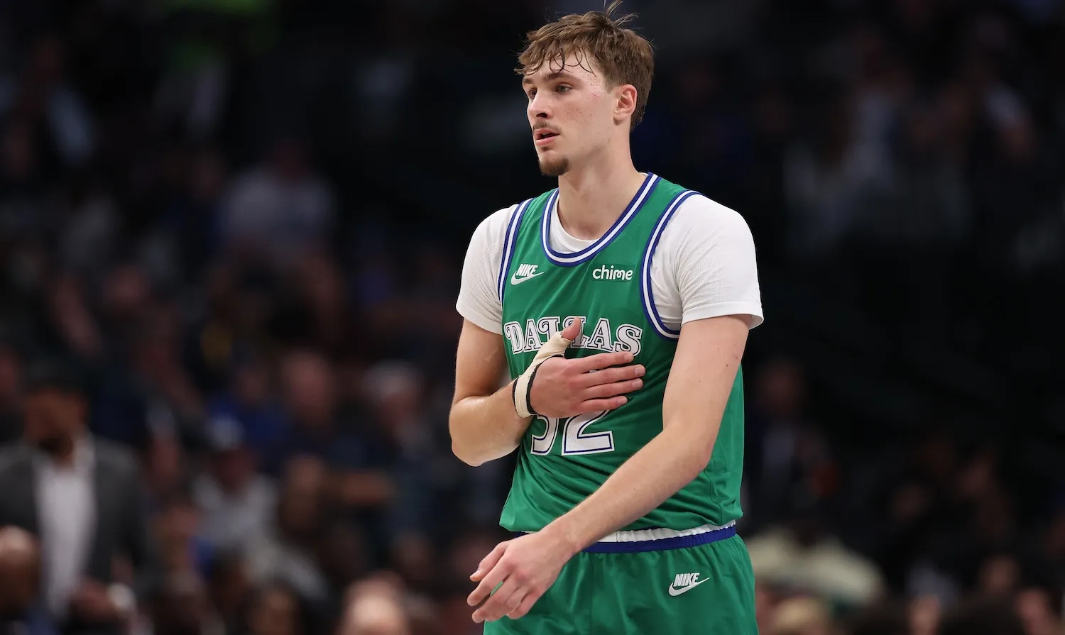Chris Eubank Jr (left) and Conor Benn during the weigh-in at York Hall, London. They are staring each other in the face while surrounded by cameras.