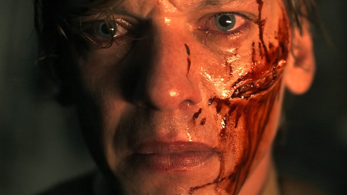 a young henry or vecna opening the briefcase he finds in stranger things 5 the finale