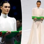 Supermodel Vittoria Ceretti carries the Italian flag in crisp white Armani during Winter Olympics 2026 opening ceremony